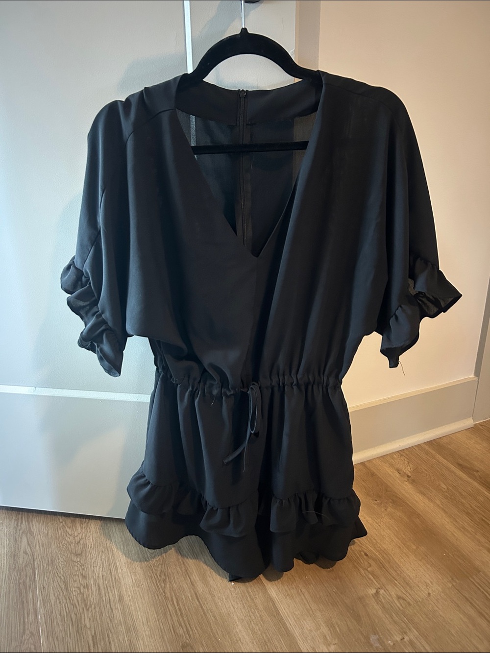 Black Short Romper with Ruffle Hem
